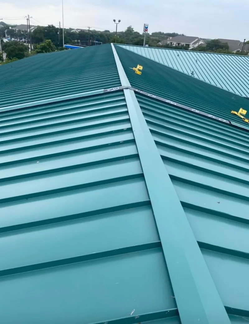 Green commercial metal roof ridge and valley for Metal Roof Repair in San Gabriel