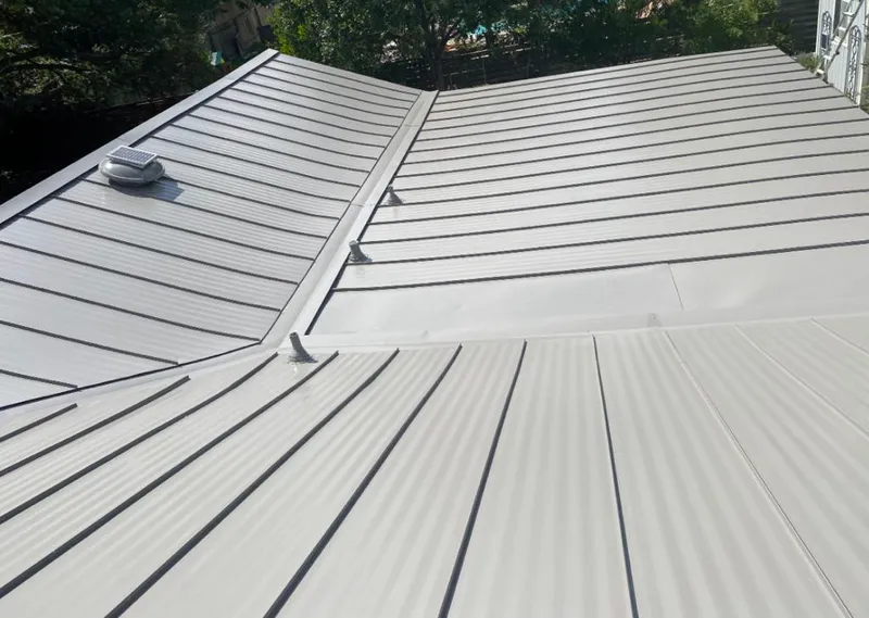 Solar attic fan installed on a metal roof for Roof Ventilation in San Gabriel